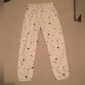 Cream colored sweatpants with stars